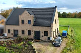 Doppelhaushälfte kaufen in 26802 Moormerland, Moderne Neubau-Doppelhaushälfte in dörflicher Lage von Warsingsfehn!