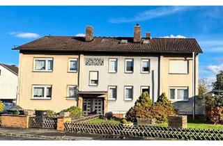 Mehrfamilienhaus kaufen in 34225 Baunatal, Baunatal - Geräumiges Mehrfamilienhaus mit vier Wohneinheiten in Baunatal