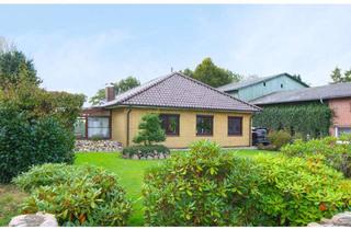 Haus kaufen in 25795 Weddingstedt, Walmdachbungalow in Weddingstedt – Modern und gepflegt mit großem Garten und Wiesenblick