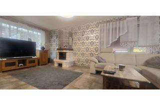 Einfamilienhaus kaufen in 42579 Heiligenhaus, Charmantes Einfamilienhaus mit Kamin, Wintergarten, großer Terrasse und zwei Garagen