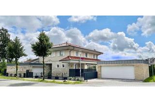 Villa kaufen in 21465 Reinbek, Große und modern-luxuriös ausgestattete Villa im Toskana-Stil am Hamburger Stadtrand zu verkaufen