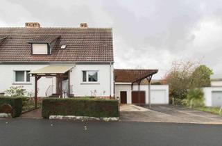 Anlageobjekt in 34582 Borken, Charmante Doppelhaushälfte mit hohem Carport, Garage und großem Garten