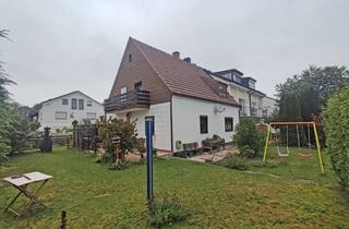 Grundstück zu kaufen in 82008 Unterhaching, Attraktives Eckgrundstück mit Altbestand, Süd-West-Lage