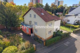 Doppelhaushälfte kaufen in 60529 Schwanheim, Familienfreundliche Doppelhaushälfte mit großem Garten und Doppelgarage in Frankfurt-Goldstein