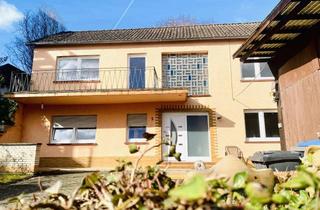 Einfamilienhaus kaufen in 56348 Dahlheim, Charmantes Einfamilienhaus im Herzen des Ortskerns