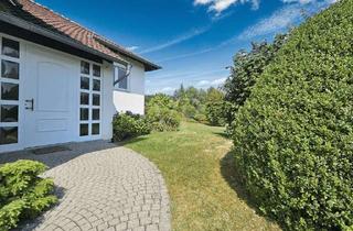 Haus kaufen in 61250 Usingen, Solides Familiendomizil mit Garage auf großem Grundstück in idyllischer Feld- und Waldrandlage