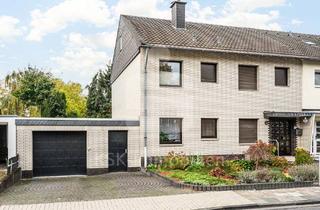 Haus kaufen in 50769 Köln, Gepflegtes Zweifamilienhaus mit Garten, Garage und solider Vermietung in Köln-Worringen!