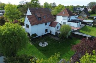 Haus kaufen in 32584 Löhne, Ideal für den Mehrgenerationenhaushalt: Großzügiges Ein - Zweifamilienhaus mit Garten in Löhne