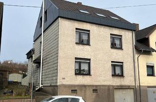 Haus kaufen in 66265 Heusweiler, Vermietetes Zweifamilienhaus in zentraler Lage von Heusweiler – Perfekte Kapitalanlage