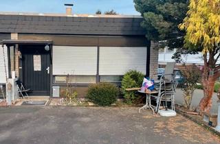 Wohnung kaufen in 56235 Ransbach-Baumbach, Ransbach-Baumbach - ETW im Bungalow-Stil am Erlenhofsee zu verkaufen.