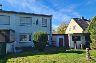 Doppelhaushälfte kaufen in 59229 Ahlen, Ahlen - Ahlener Nordosten, eine kleine Doppelhaushälfte mit Vollkeller, Garage und großzügigem Garten in einer Spielstraße.