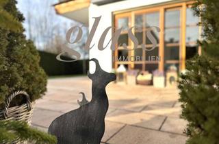 Wohnung kaufen in 83700 Rottach-Egern, Alpenstil & Wärme – Gartenwohnung mit Kachelofen und sonnigem Garten