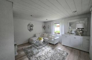 Haus kaufen in 71729 Erdmannhausen, Zweifamilienhaus mit Doppelgarage, Wellnessbereich und liebevoll gestaltetem Garten