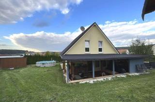 Einfamilienhaus kaufen in 34329 Nieste, Einfamilienhaus aus 2015 mit ca 157 m² in Nieste mit Terrasse, Garten und Garagen