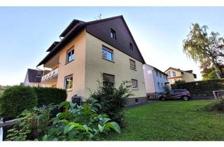 Mehrfamilienhaus kaufen in 61231 Bad Nauheim, Mehrfamilienhaus mit drei Wohneinheiten mit drei Garagen und Garten