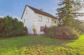 Haus kaufen in 63796 Kahl, Kahl am Main - Großes Familienhaus auf 1.239 m² Parkgrundstück - ca. 185 m² Wfl., 3 Balkone, Terrasse & 2 Garagen