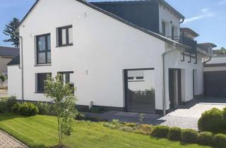 Wohnung mieten in 60433 Bonames, EG & Souterrain mit Garten – Erstbezug in modernem Effizienzhaus 40 im Frankfurter Berg