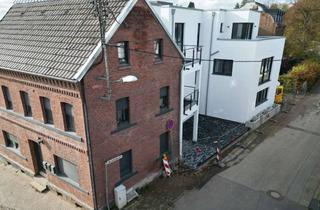 Wohnung kaufen in 53919 Weilerswist, Wohnen mit Geschichte – Modernes Apartment im historischen Gebäudeensemble