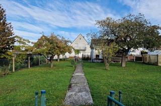 Einfamilienhaus kaufen in 55291 Saulheim, Saulheim - Siedlungshaus mit großem Grundstück in Saulheim