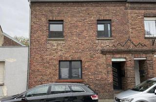 Einfamilienhaus kaufen in 41515 Grevenbroich, geräumiges Mehrfamilienhaus mit großem Garten für Ihre neuen Mieter!