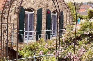 Wohnung mieten in 55296 Gau-Bischofsheim, Stilvolle 2-Zimmer-DG-Wohnung mit Balkon und Einbauküche in Gau-Bischofsheim