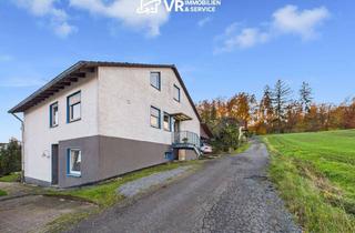 Haus kaufen in 36280 Oberaula, Zweifamilienhaus mit vermieteter Einliegerwohnung in ruhiger Lage