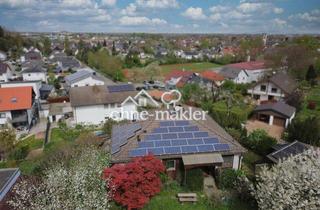Haus kaufen in Diezenthalweg 2, 79426 Buggingen, Wohnhaus mit Vogesenblick auf großem Grundstück.