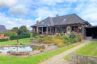 Einfamilienhaus kaufen in 28857 Syke, Provisionsfrei! Wunderschönes Einfamilienhaus mit Wintergarten und Garage auf großem Grundstück i...