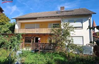 Haus kaufen in 97215 Simmershofen, Vielseitiges MFH mit vier Wohneinheiten, Doppelgarage & großem Garten in 97215 Simmershofen