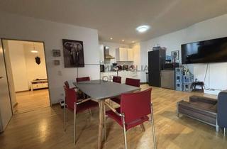 Wohnung kaufen in 45130 Rüttenscheid, Für Jung und Alt: Vermietete 4-Zimmer-Erdgeschosswohnung im ruhigen Hinterhof