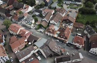 Haus kaufen in Hauptstraße 11, 61273 Wehrheim, Geschäftshaus mit Ladenfläche in etablierter Einkaufslage und großzügigen Wohnungen in Wehrheim-City