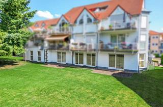 Gewerbeimmobilie kaufen in 66740 Saarlouis, Gewerbeeinheiten im Erdgeschoss mit 7 Außenstellplätzen, 2 Tiefgaragenstellplätzen und Gartennutzung