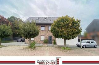 Doppelhaushälfte kaufen in 52511 Geilenkirchen, Geilenkirchen / Waurichen - Attraktives Zweifamilienhaus mit angrenzender Doppelhaushälfte, Stellplatz und zwei Garagen