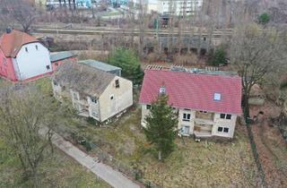 Mehrfamilienhaus kaufen in 06749 Bitterfeld-Wolfen, Bitterfeld-Wolfen - 2 Mehrfamilienhäuser mit großem Grundstück in Bitterfeld-Wolfen ?