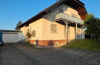Haus kaufen in 55481 Kirchberg, Kirchberg (Hunsrück) - Zweifamilienhaus mit Doppelgarage