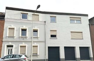 Haus kaufen in 52355 Düren, Solides Dreifamilienhaus mit 3 Garagen und viel Nutzfläche