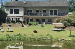 Einfamilienhaus kaufen in 29389 Bad Bodenteich, Modernisiertes Einfamilienhaus mit eigenen Teich und kleinem Waldstück in privater Lage