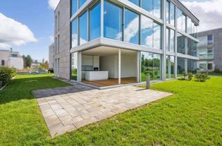 Wohnung kaufen in 61231 Bad Nauheim, Exklusiv Wohnen in Bad Nauheim: Lichtdurchflutete 3-Zimmer-Eigentumswohnung mit großem Gartenanteil