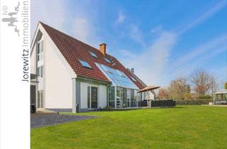 Einfamilienhaus kaufen in 33334 Gütersloh, Gütersloh - Familienfreundliches Einfamilienhaus in Top-Lage von GT-Isselhorst (Spielstraße) mit schönem Garten