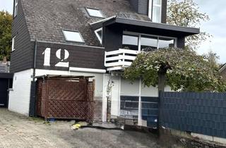 Wohnung kaufen in 49549 Ladbergen, Souterrainwohnung in zentraler Ortslage