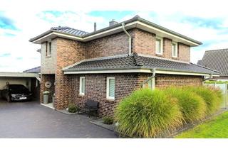 Villa kaufen in 26919 Brake, Eleganz und Wohnkomfort vereint: Moderne Stadtvilla in begehrter Lage von Brake-Golzwarden