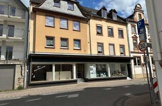 Haus kaufen in 56856 Zell, 2 vermietete MFH mit insges. 5-6 Wohnungen, Gewerbefläche und Garagen in attraktiver Lage von Zell