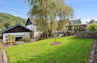 Haus kaufen in 53773 Hennef, Engel & Völkers: Wohnensemble im Grünen!