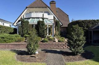 Haus kaufen in 32584 Löhne, Löhne - Geschmackvolles 1-2-Familienhaus mit Wintergarten und Gartenidylle