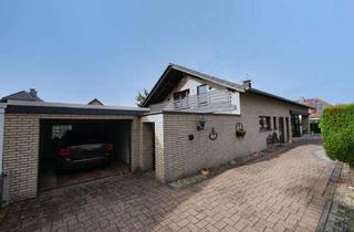 Wohnung kaufen in 33161 Hövelhof, Charmante Doppelhaushälfte mit Wintergarten, Kamin und sonnigem Garten in Hövelhof