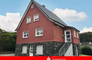 Einfamilienhaus kaufen in 57584 Scheuerfeld, Modernisiertes freistehendes Einfamilienhaus in zentraler Lage