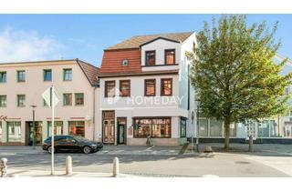 Mehrfamilienhaus kaufen in 39288 Burg, Mehrfamilienhaus mit Gewerbeeinheit und zwei sanierungsbedürftigen Wohneinheiten im Zentrum von Burg