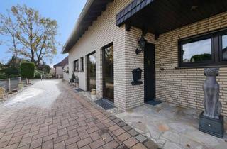 Doppelhaushälfte kaufen in 33161 Hövelhof, Charmante Doppelhaushälfte mit Wintergarten, Kamin und sonnigem Garten in Hövelhof