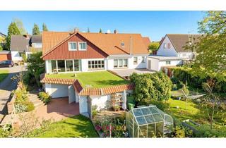 Doppelhaushälfte kaufen in 38350 Helmstedt, Mehr als nur eine Doppelhaushälfte – Haus mit Wintergarten, Kamin & Traumgarten