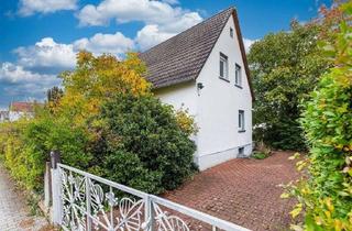 Einfamilienhaus kaufen in 65479 Raunheim, Jung & Kern Immobilien - Einfamilienhaus auf großem Grundstück - mit viel Potenzial